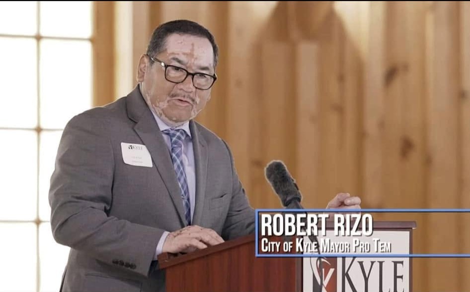 Robert Rizo speaking at a Kyle Chamber of Commerce meeting as Mayor Pro Tem